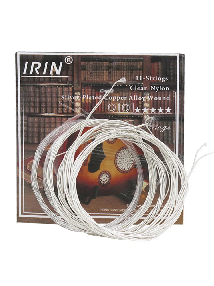 A set of 11-string clear nylon and silver-plated copper alloy strings is shown coiled on a product box.