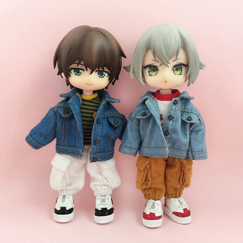 Two 1/12 scale dolls wearing denim jackets and casual clothing, one with dark hair and one with silver hair.