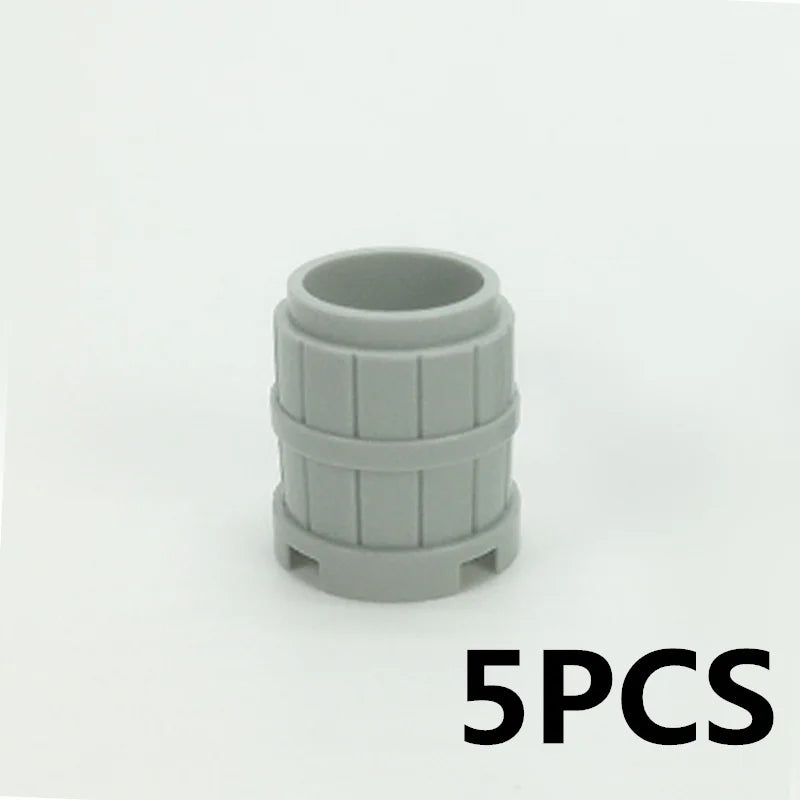 Five gray cylindrical building blocks used as a treasure chest set.