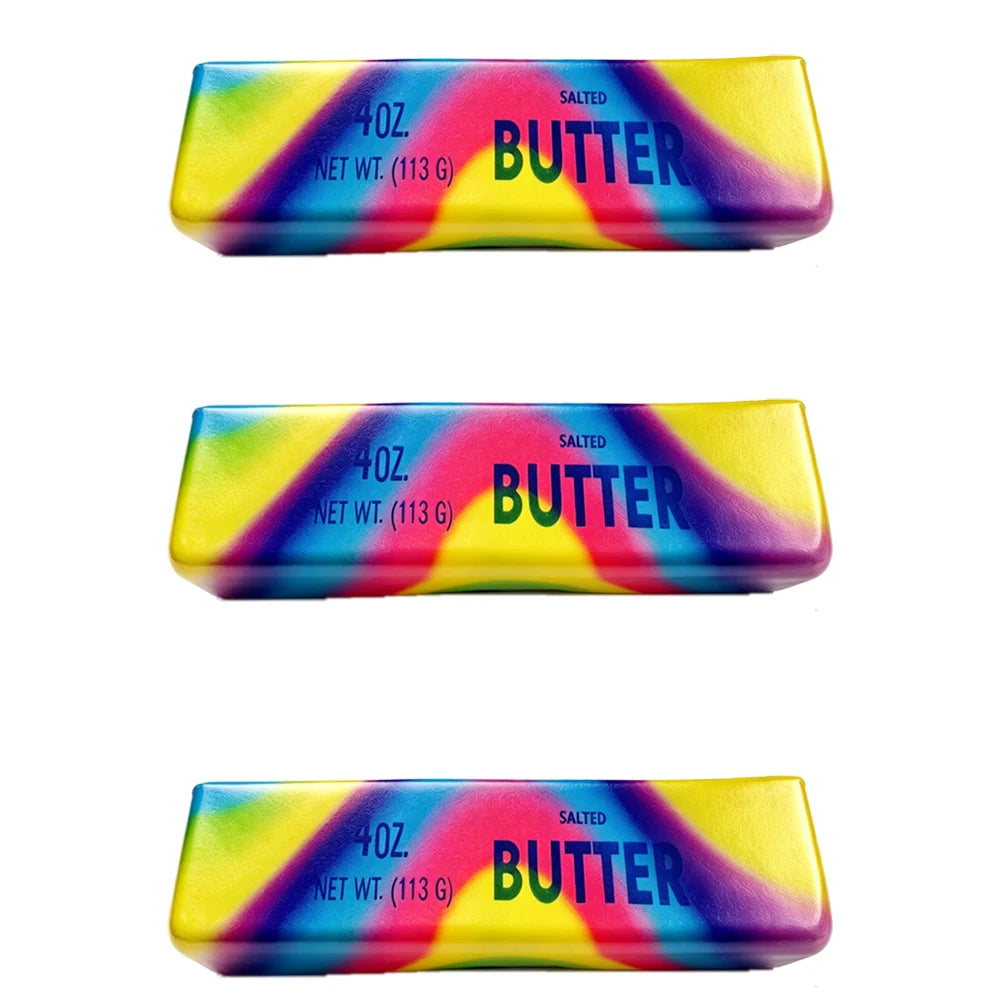 A colorful, rainbow-striped butter stick squishy toy labeled salted butter.