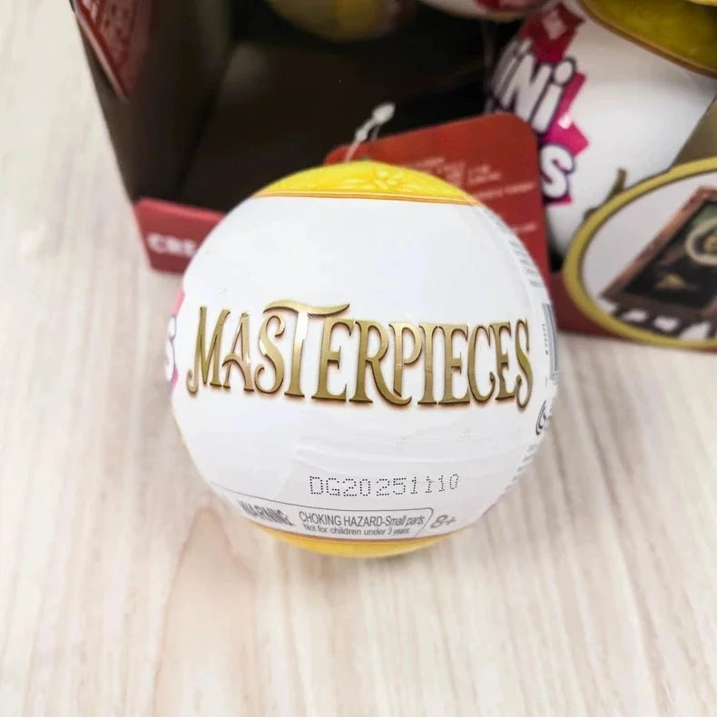 A white blind ball labeled MASTERPIECES is shown next to other Zuru Mini Brands Create products.