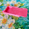 A pink Diamond painting organizer tray with storage compartments is shown on a colorful background.