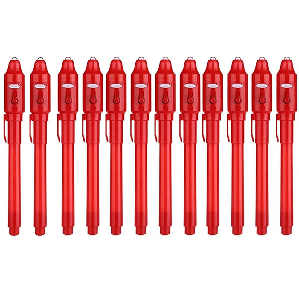 A set of red invisible ink spy pens with UV light for secret messages