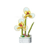 A building block set featuring a bouquet of rose flowers with yellow petals and green stems.