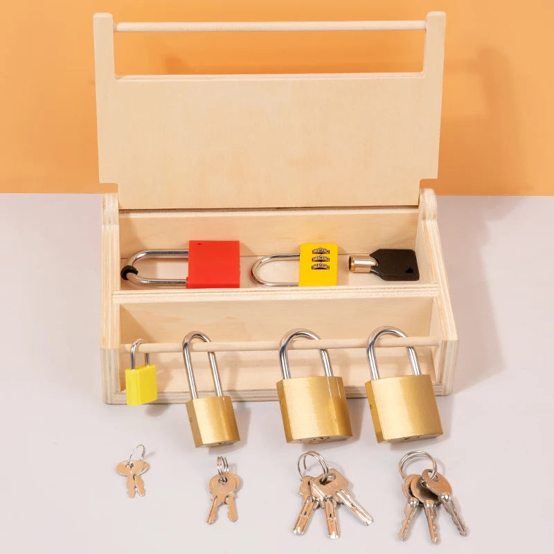 A wooden lock and key toy set with various sized keys and locks displayed in a light wooden box.