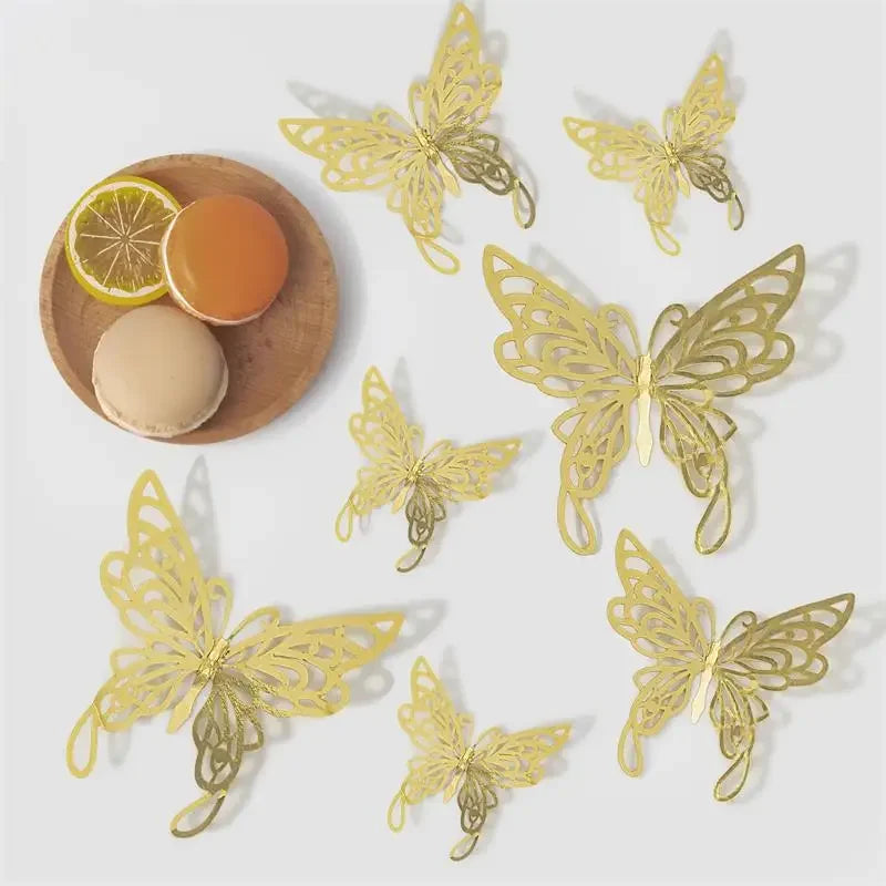 Rose gold 3D butterfly wall stickers displayed with a slice of citrus and a round object.