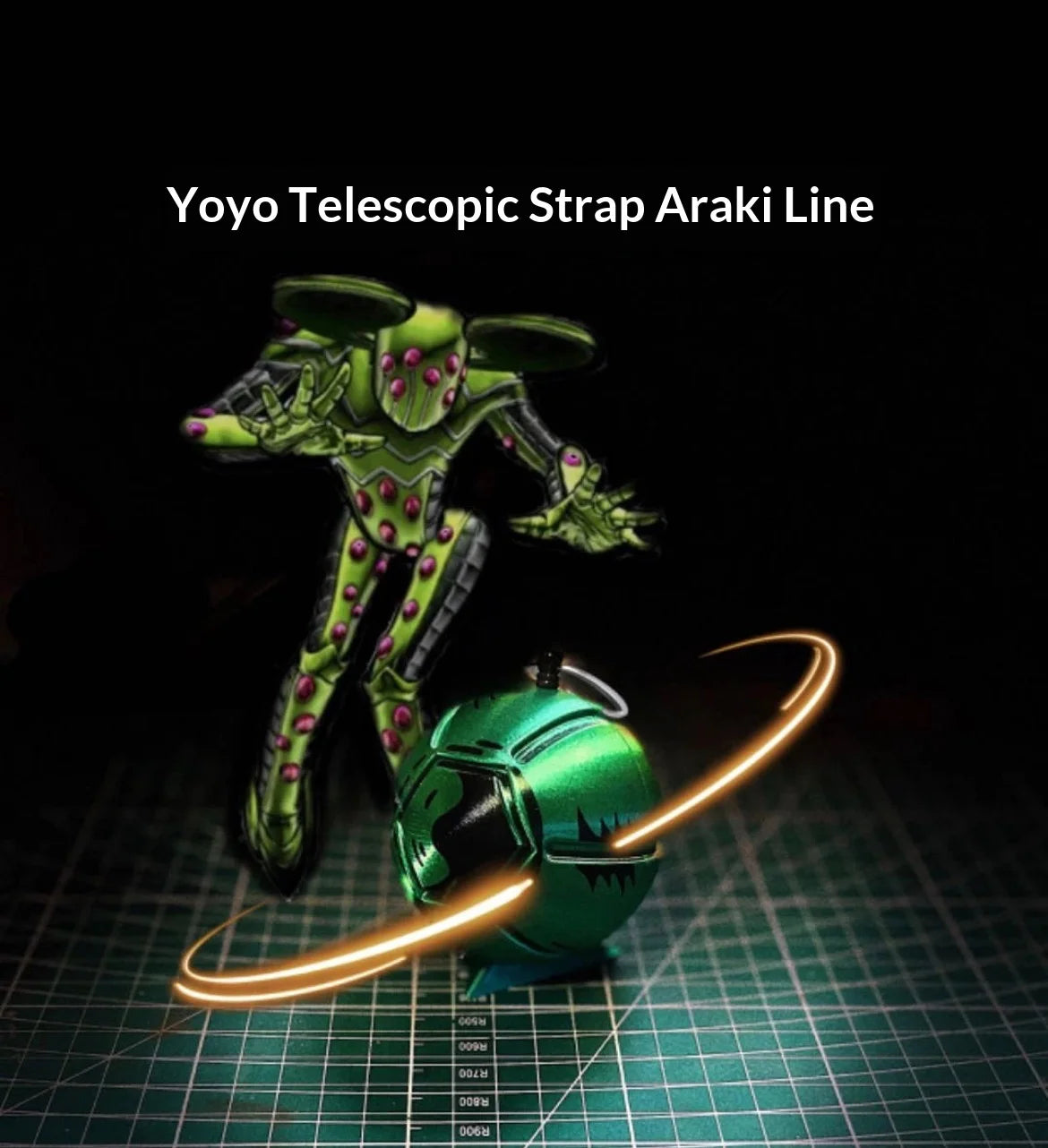 A green, insect-like figure is shown with a glowing orange wire, representing the Yoyo Telescopic Strap Araki Line product.