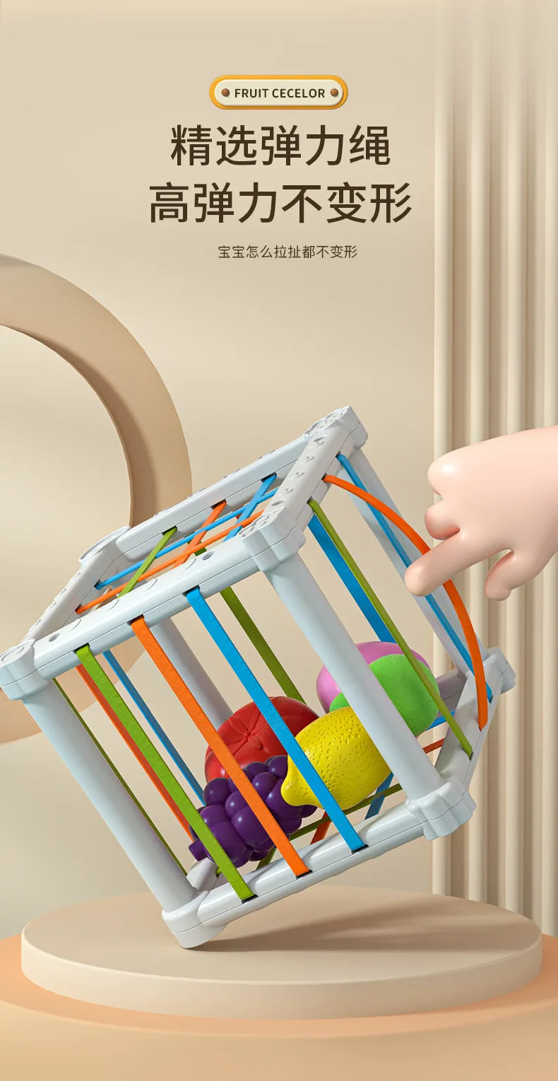 A white Montessori shape sorter cube filled with colorful rings and shapes, demonstrating its durable design.