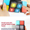 A hand holds a flexible lighting puzzle cube with multiple colored blocks and a display.