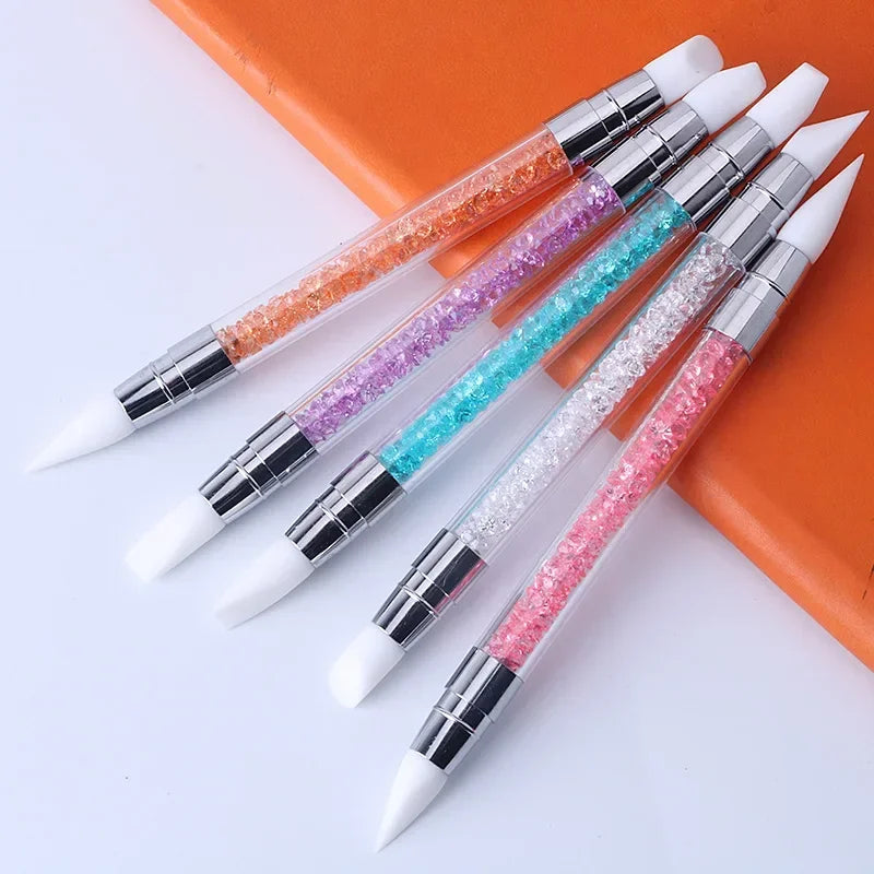 A set of dual-ended silicone head nail art dotting pens with crystal handles in various colors