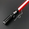 A black lightsaber with a red blade and a chain attached, shown against a dark background.