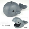 Gray plastic marine animal building blocks set featuring a shark or whale design.