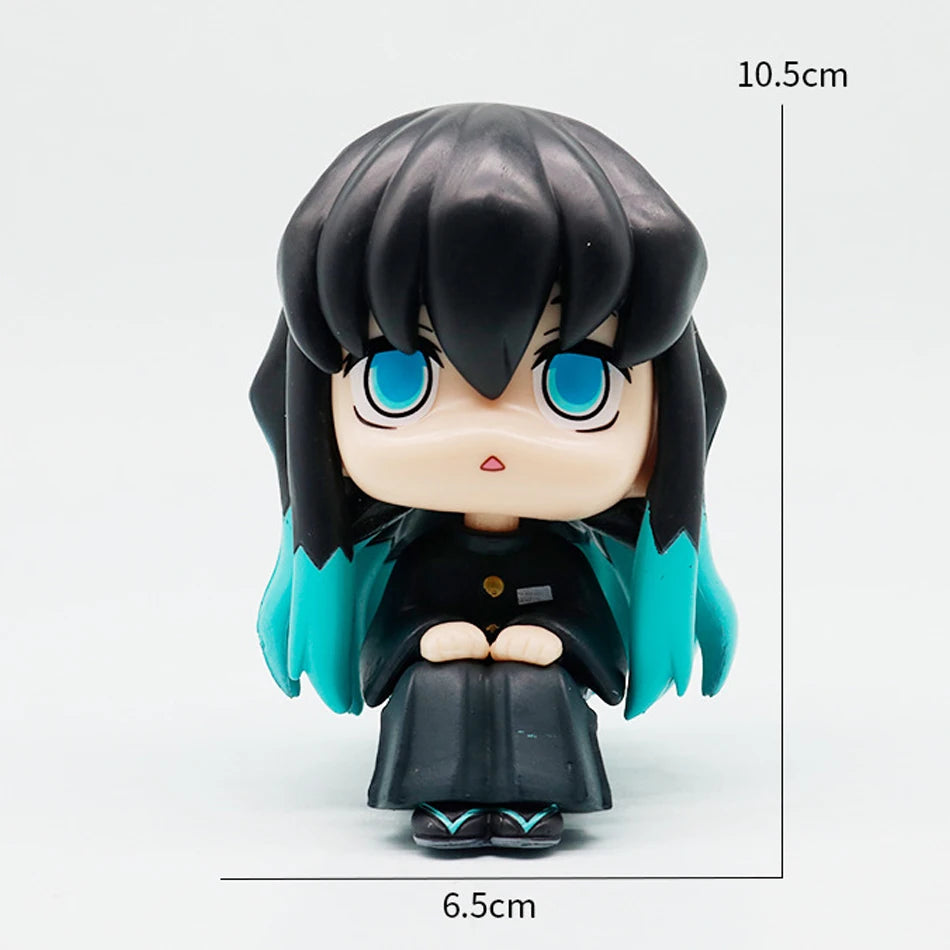 A figure set of Tanjiro and Nezuko from Demon Slayer, featuring black hair, teal accents, and large blue eyes.
