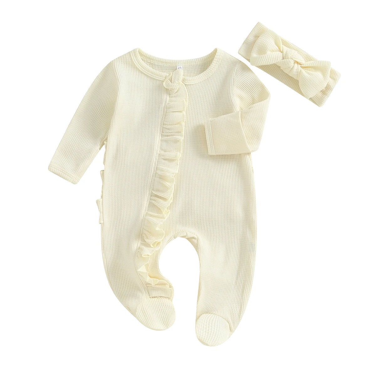 A cream knit romper for a baby girl featuring ruffled details and a matching bow headband.