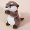 A brown and white otter plush toy with soft fur and a cute expression.