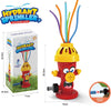 A yellow and red cartoon fire hydrant water sprinkler toy with colorful flexible tubes for outdoor play.