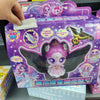 A purple box featuring a Teenieping Shining Meteor Aurora doll in a winged figure design with silver and pink accents.