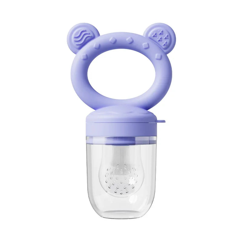 A purple silicone baby fruit feeder set with a clear plastic container and a silicone lid.