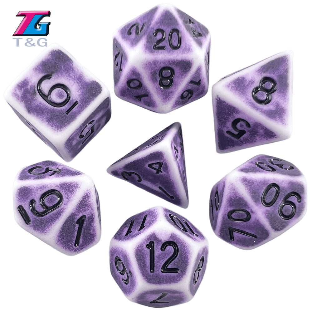 A set of purple and white polyhedral dice including d20, d8, d10, d6, d12, and d100 dice.