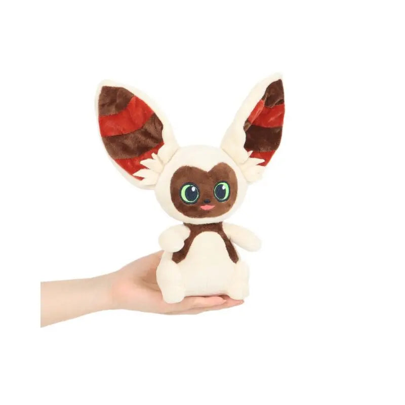 A plush doll of Momo or Appa from Avatar: The Last Airbender featuring brown and white fur with red markings.