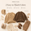 A flat lay of two knit sweaters in beige and mocha brown for kids, showing daily wear and gift ideas.
