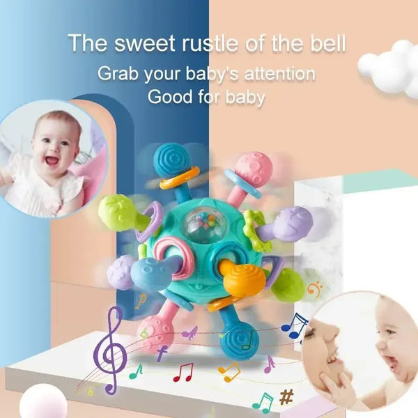 A colorful silicone rattle ball toy for baby sensory development is shown with musical notes and a baby's face.