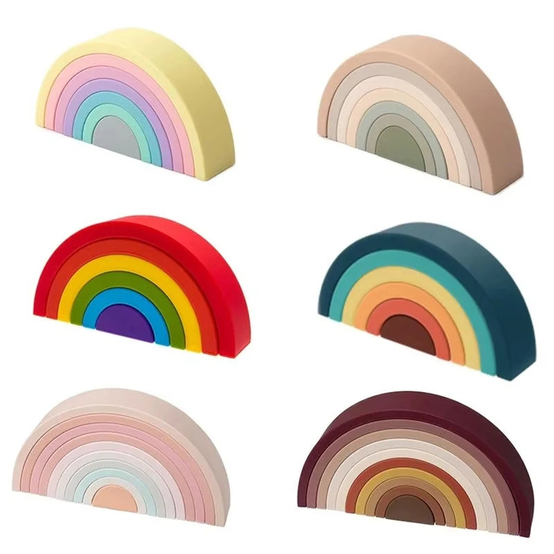 A collection of colorful silicone rainbow building blocks in various shades and angles.