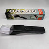 A black handheld insect catcher with a clear magnifying lens is shown next to its retail box.