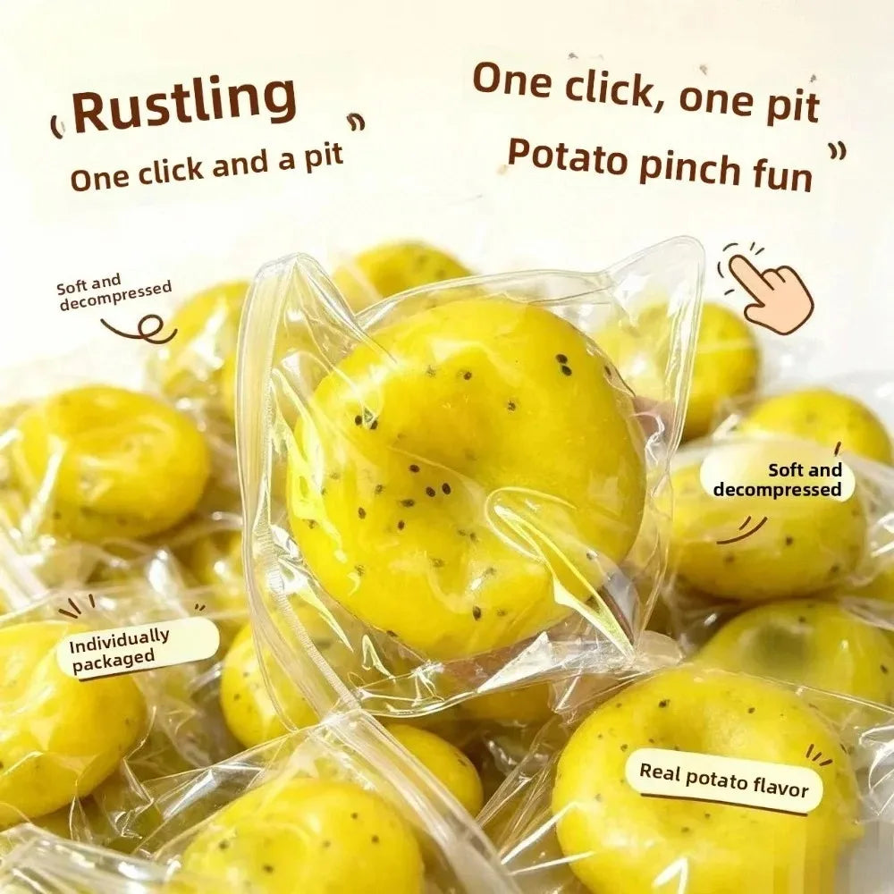Yellow potato pinch fun slime squishy stress relief toy packaged in a clear plastic bag