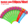 A fan of colorful self-sealing water balloons with green, red, and blue colors arranged in a semi-circle.