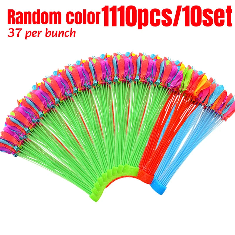 A fan of colorful self-sealing water balloons with green, red, and blue colors arranged in a semi-circle.