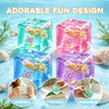 Colorful cube shaped squishy stress balls in various shades of blue, pink, and purple with sea life designs
