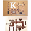 A wooden craft kit featuring letters spelling out KAYGAN and STEPHANIE, with a family photo included.