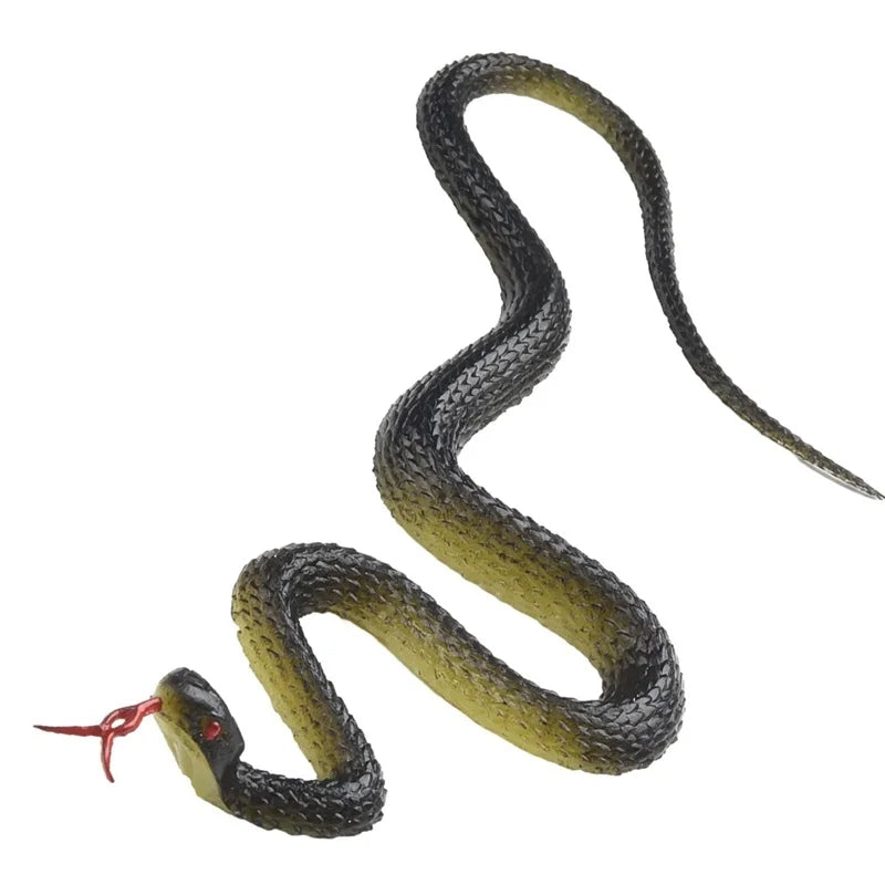A realistic rubber snake prop with a yellow-green body and red head, coiled in an S shape.