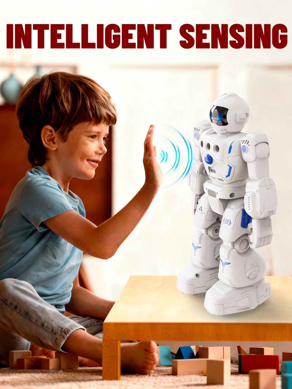 A young boy interacts with an intelligent sensing robot toy on a wooden table.