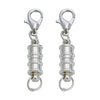 A pair of silver magnetic clasps for jewelry making with strong metal connectors.