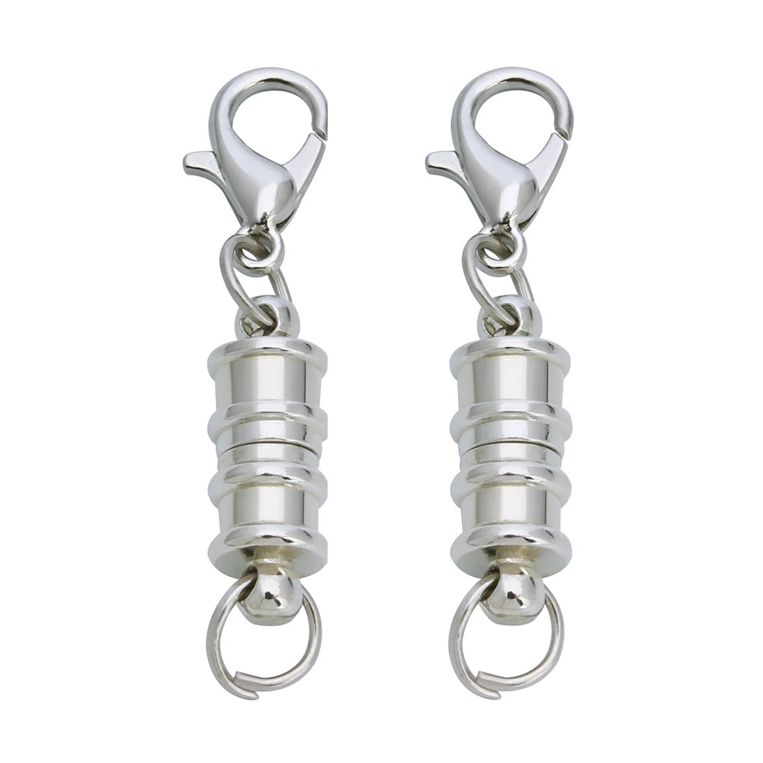 A pair of silver magnetic clasps for jewelry making with strong metal connectors.