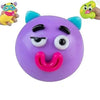 A purple moldable dog face squishy stress relief toy with black eyes and a pink tongue.