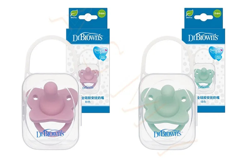 A set of Dr Brown's soft silicone baby pacifiers and soothers in pink and green colors.