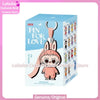 A pink Labubu cultural and creative store pin for love keychain plush doll in a box.