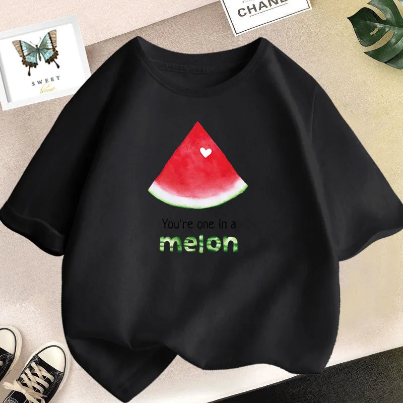 Black t-shirt featuring a red watermelon slice graphic with a heart and the text You're one in a melon