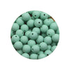 A circular arrangement of 50 silicone beads in various sizes and shades of mint green.
