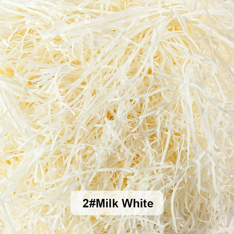White raffia paper shreds used for gift boxes and baskets
