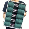 A pack of five skeins of soft green alpaca wool yarn for knitting and crochet.