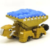 A yellow die-cast dinosaur truck toy with a blue removable dinosaur figure on top.