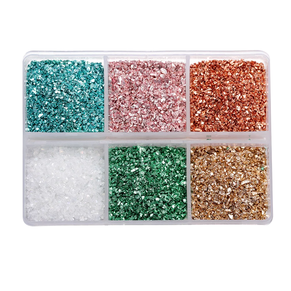 A clear plastic box containing various colors of crushed glass stones for resin and craft projects.