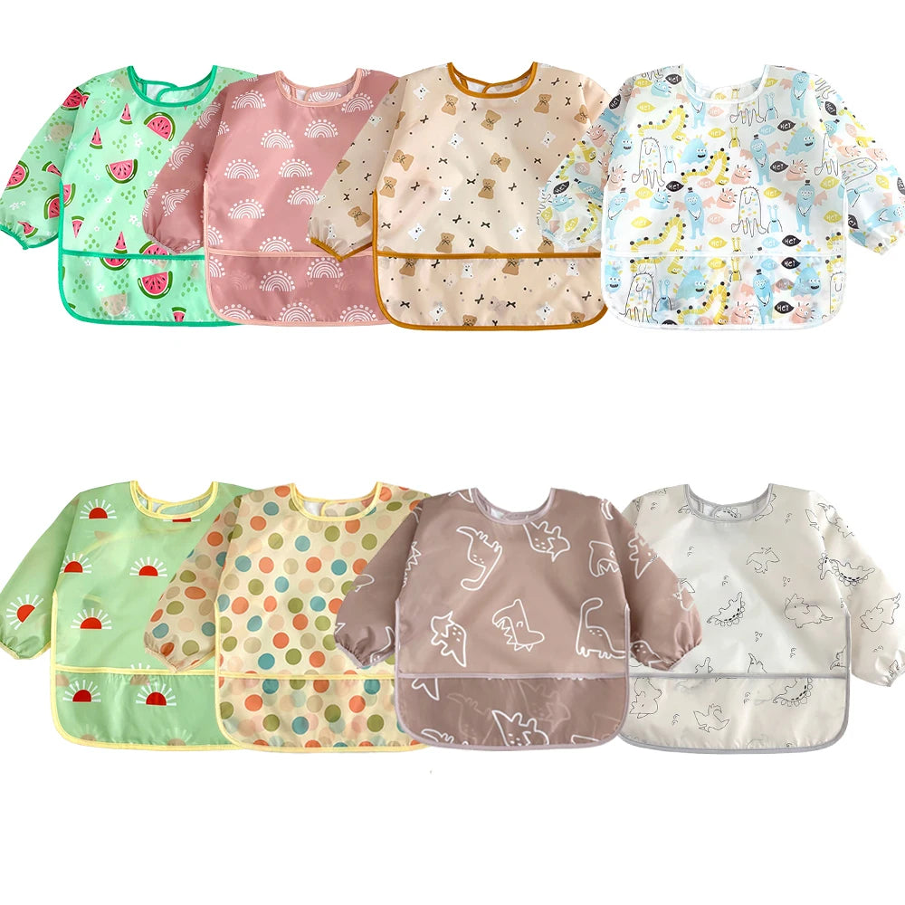 A set of six waterproof full sleeve baby bibs featuring various patterns and colors for feeding.