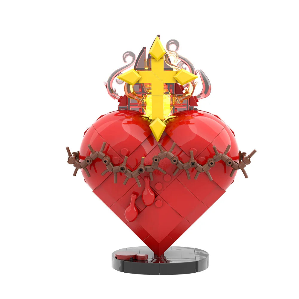 A red heart shaped building block set featuring a golden crown and decorative elements.