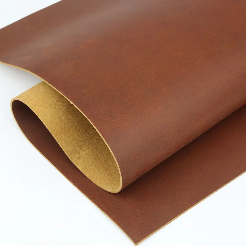 Roll of rust red crazy horse leather hide with an oily finish for DIY projects