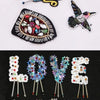 Assortment of 1.5mm solid glass seed beads in various colors and shapes for jewelry and craft projects